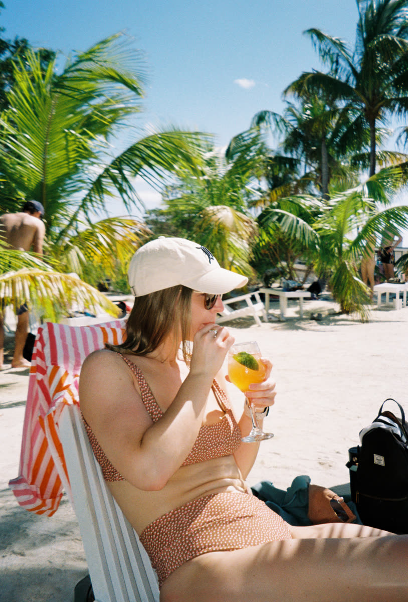 Cocktail on the beach under palm trees